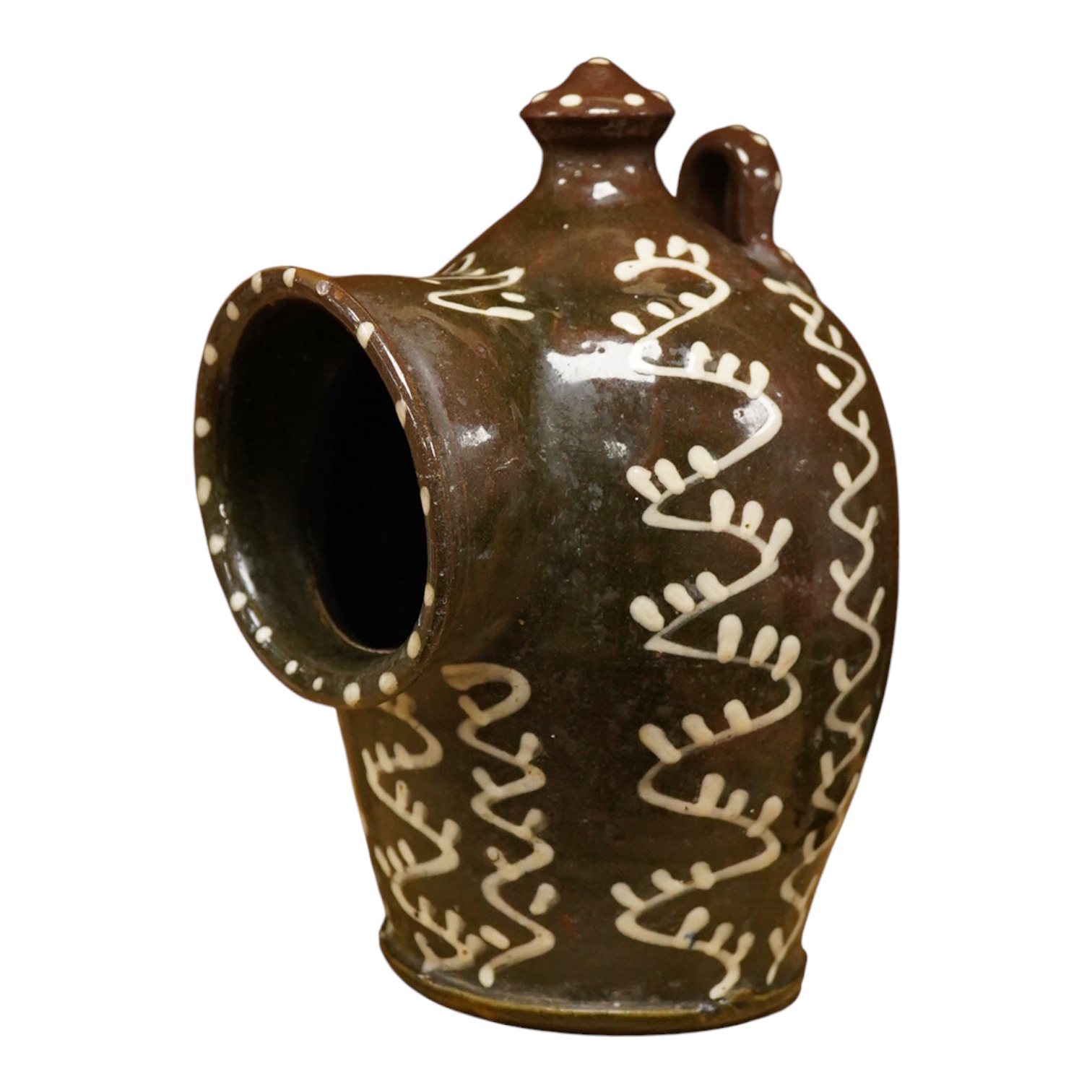 A slipware pottery salt jar, 27cm high